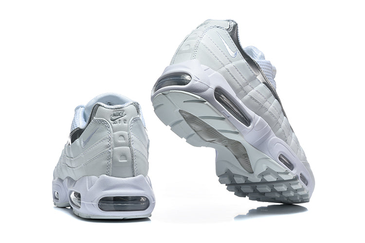 Nike Air Max 95 in an all-white and metallic silver colorway.