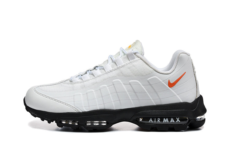 Nike Air Max 95 in a white/orange/black colorway.