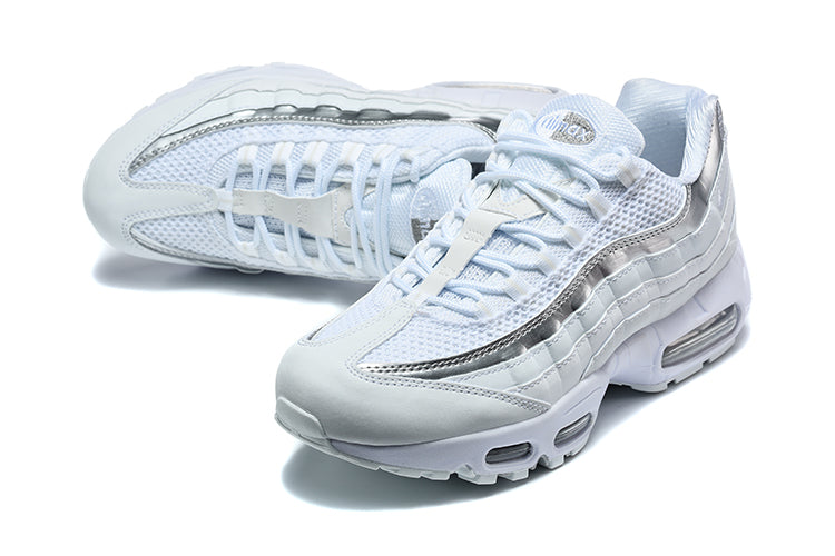 Nike Air Max 95 in an all-white and metallic silver colorway.