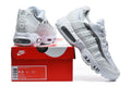 Nike Air Max 95 in an all-white and metallic silver colorway.