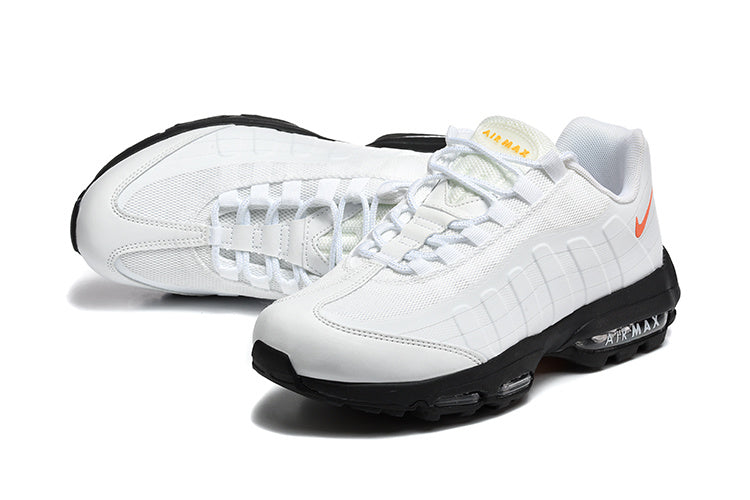 Nike Air Max 95 in a white/orange/black colorway.
