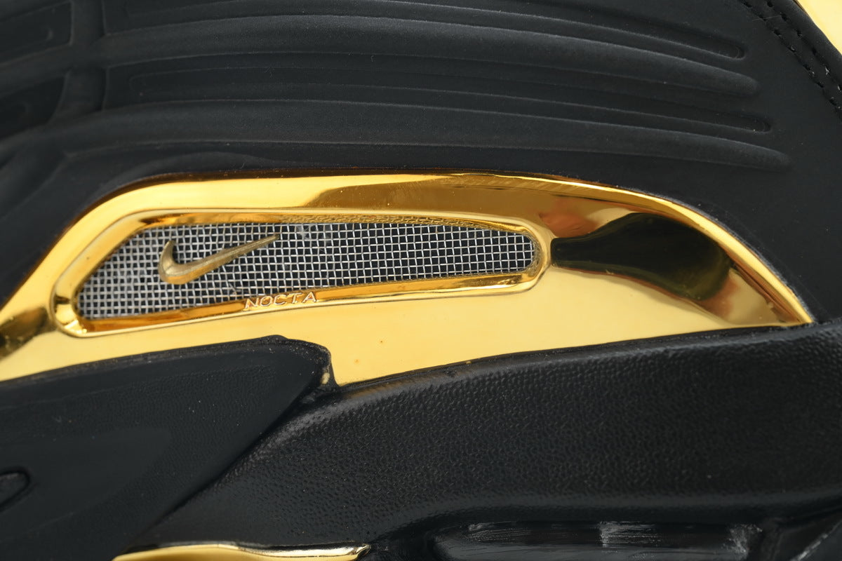 Nike Hot Step 2 x Drake NOCTA Black/Gold" Goldfarbige Ferse + Schaft, matt schwarzes Obermaterial